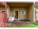 Patio area with a door and window view of the backyard at 309 Pheasant Run, Louisville, CO 80027