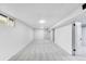 Spacious basement with neutral carpet and a window at 1810 S Kearney St, Denver, CO 80224