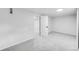 Basement area with neutral carpet and white walls at 1810 S Kearney St, Denver, CO 80224