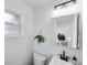 Stylish bathroom with modern fixtures, a sleek vanity, and a bright, clean design at 1810 S Kearney St, Denver, CO 80224