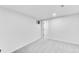 Spacious bedroom with neutral carpet and a window at 1810 S Kearney St, Denver, CO 80224