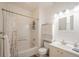Bright bathroom with a shower-tub combination, vanity, and medicine cabinet for storage at 10482 Billings St, Commerce City, CO 80022