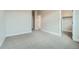 Bedroom featuring neutral-colored carpet and a walk-in closet at 2751 E 102Nd Pl, Thornton, CO 80229