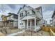 Two-story home with inviting covered porch and well-kept gravel landscaping at 2751 E 102Nd Pl, Thornton, CO 80229