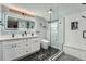 Elegant bathroom featuring double vanity, large glass shower, and modern design at 7823 S Locust Ct, Centennial, CO 80112