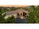 Stunning home featuring an attached three car garage and gorgeous xeriscaping with a beautiful mountain view at 6948 Fox Cir, Larkspur, CO 80118