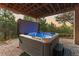 Relax in this beautiful hot tub with stunning views of nature at 6948 Fox Cir, Larkspur, CO 80118