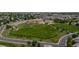 The aerial view captures the proximity to the school and park at 13753 Monroe St, Thornton, CO 80602