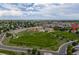 Aerial view showcasing the house's proximity to the park, school, and neighborhood at 13753 Monroe St, Thornton, CO 80602