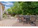 Enjoy outdoor living on this spacious deck, perfect for dining and relaxing with a view of the lush backyard at 13753 Monroe St, Thornton, CO 80602