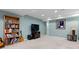 Finished basement with neutral carpet, recessed lighting, and entertainment center perfect for Gathering movie nights at 13753 Monroe St, Thornton, CO 80602
