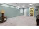 Finished basement leads to a bathroom featuring neutral carpet and recessed lighting perfect for entertaining guests at 13753 Monroe St, Thornton, CO 80602