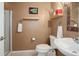 A compact bathroom featuring a walk-in shower and coordinated fixtures creating a functional space at 787 Eldorado Dr, Superior, CO 80027