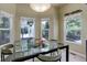 Cozy dining area features large windows and contemporary lighting at 787 Eldorado Dr, Superior, CO 80027