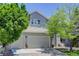 Front exterior showcasing a well-maintained yard, attached garage, and appealing architectural details at 787 Eldorado Dr, Superior, CO 80027