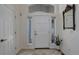 Inviting foyer with neutral decor, tiled flooring, and large windows providing ample natural light at 787 Eldorado Dr, Superior, CO 80027