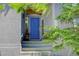 Charming home entrance with a bright blue front door, sidelights, and a welcoming staircase at 787 Eldorado Dr, Superior, CO 80027