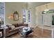 Bright living room features hardwood floors, high ceilings, and large windows for natural light at 787 Eldorado Dr, Superior, CO 80027