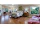 Spacious main bedroom features hardwood floors, plenty of natural light, and comfortable seating at 787 Eldorado Dr, Superior, CO 80027