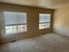 Bedroom with carpet and window blinds at 7482 W Saratoga Pl, Littleton, CO 80123