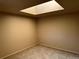 Bright bedroom with skylight and carpet at 7482 W Saratoga Pl, Littleton, CO 80123