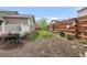 Enjoy this backyard space with a small deck, perfect for relaxation and outdoor activities at 481 Vista Blvd, Brighton, CO 80603