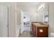 Bathroom with a shower, tub, and vanity with sink at 481 Vista Blvd, Brighton, CO 80603