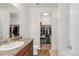 Bathroom with dual walk-in closets and tile flooring at 481 Vista Blvd, Brighton, CO 80603