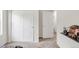 Neutral bedroom with closet doors and carpet at 481 Vista Blvd, Brighton, CO 80603