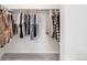 Walk-in closet with hanging rods at 481 Vista Blvd, Brighton, CO 80603