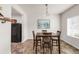 Inviting dining room featuring a wooden table and chairs, perfect for Gathering meals at 481 Vista Blvd, Brighton, CO 80603
