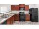 Well-equipped kitchen with modern appliances and ample counter space at 481 Vista Blvd, Brighton, CO 80603