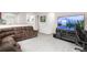 Relaxing living room featuring a plush sectional sofa, perfect for entertaining at 481 Vista Blvd, Brighton, CO 80603