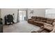 Comfortable living room with sliding glass door and large sectional at 481 Vista Blvd, Brighton, CO 80603