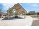 An outdoor picnic area with tables and benches are under a sheltered area at 481 Vista Blvd, Brighton, CO 80603