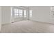 Bright bedroom with large windows and carpet at 3929 Treadway Pt, Castle Rock, CO 80108