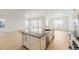 Spacious kitchen with a large island and modern stainless steel appliances at 3929 Treadway Pt, Castle Rock, CO 80108
