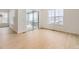 Bright living room featuring sliding glass doors to a deck and stylish hardwood floors at 3929 Treadway Pt, Castle Rock, CO 80108