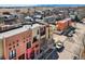 Community aerial view showcasing modern, colorful townhome architecture at 801 Confidence Dr # 9, Longmont, CO 80504