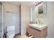 Stylish bathroom featuring modern tile, floating vanity, and contemporary fixtures at 801 Confidence Dr # 9, Longmont, CO 80504