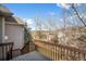 Open deck with wood railings offering scenic views and outdoor enjoyment at 3966 Aspen Hollow Ct, Castle Rock, CO 80104