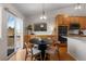 Dining area connects to the kitchen and features access to the backyard deck at 3966 Aspen Hollow Ct, Castle Rock, CO 80104