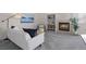 Comfortable living room with fireplace, built-in shelving, soft, neutral palette, and stylish decor at 3966 Aspen Hollow Ct, Castle Rock, CO 80104