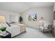 Bright main bedroom features a vaulted ceiling, a large window, and a seating area at 3966 Aspen Hollow Ct, Castle Rock, CO 80104