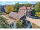 An elevated view of two brick houses, showcasing the architectural style and landscape at 2736 W 24Th Ave, Denver, CO 80211
