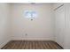 Spacious bedroom with double door closet and wood flooring at 1901 Clinton St, Aurora, CO 80010