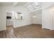 Bright dining room with skylights and hardwood floors at 1901 Clinton St, Aurora, CO 80010