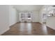 Bright living room with hardwood floors and large windows at 1901 Clinton St, Aurora, CO 80010