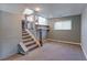 Cozy finished basement featuring stairs with carpeted steps and view of the Gathering room at 10926 Dahlia Way, Thornton, CO 80233