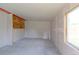Unfinished basement featuring concrete floor, a window, and visible framing ready for your personal touch at 10926 Dahlia Way, Thornton, CO 80233